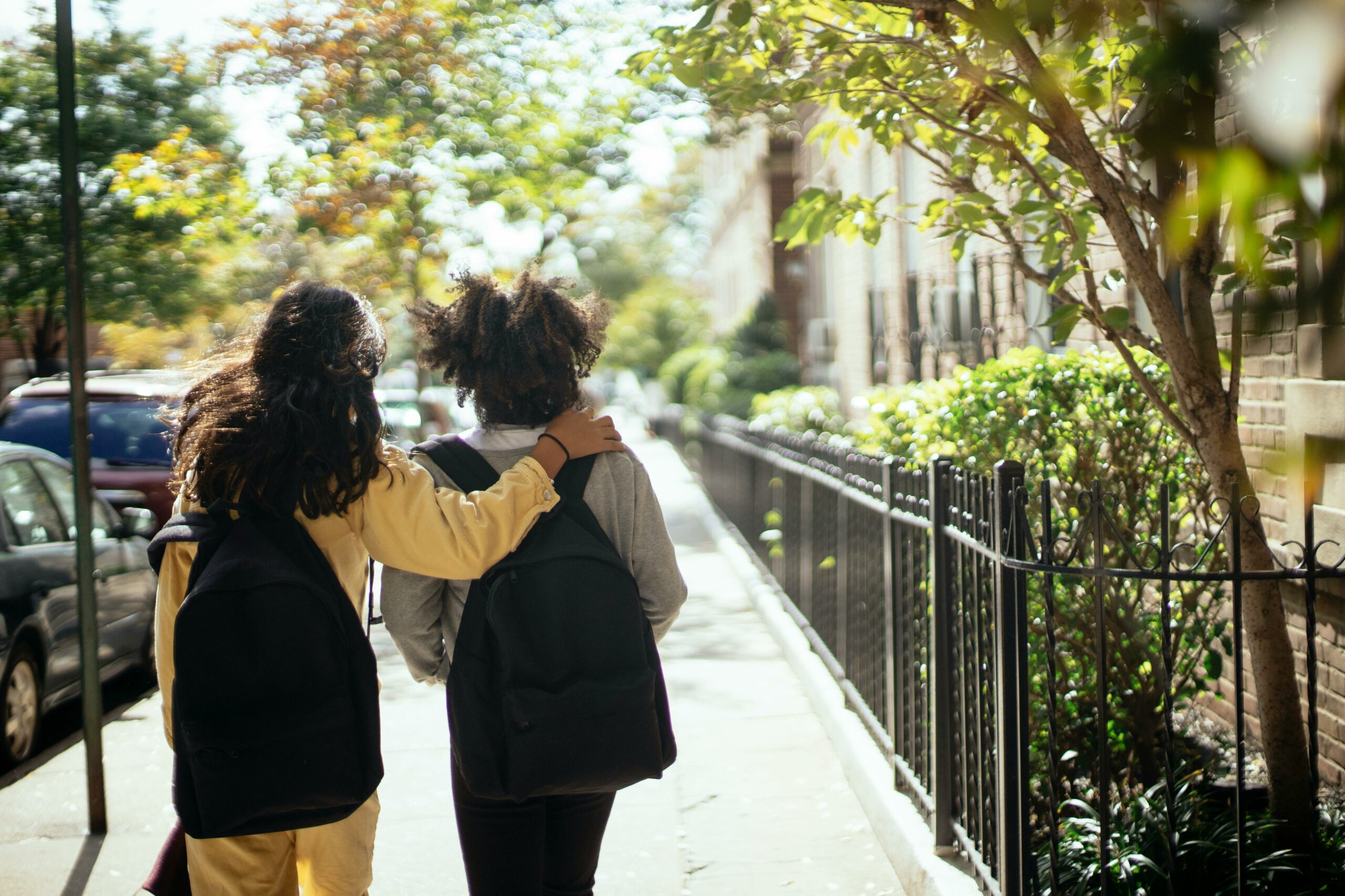 Photo by Mary Taylor: https://www.pexels.com/photo/anonymous-schoolgirls-with-backpacks-walking-together-5896916/