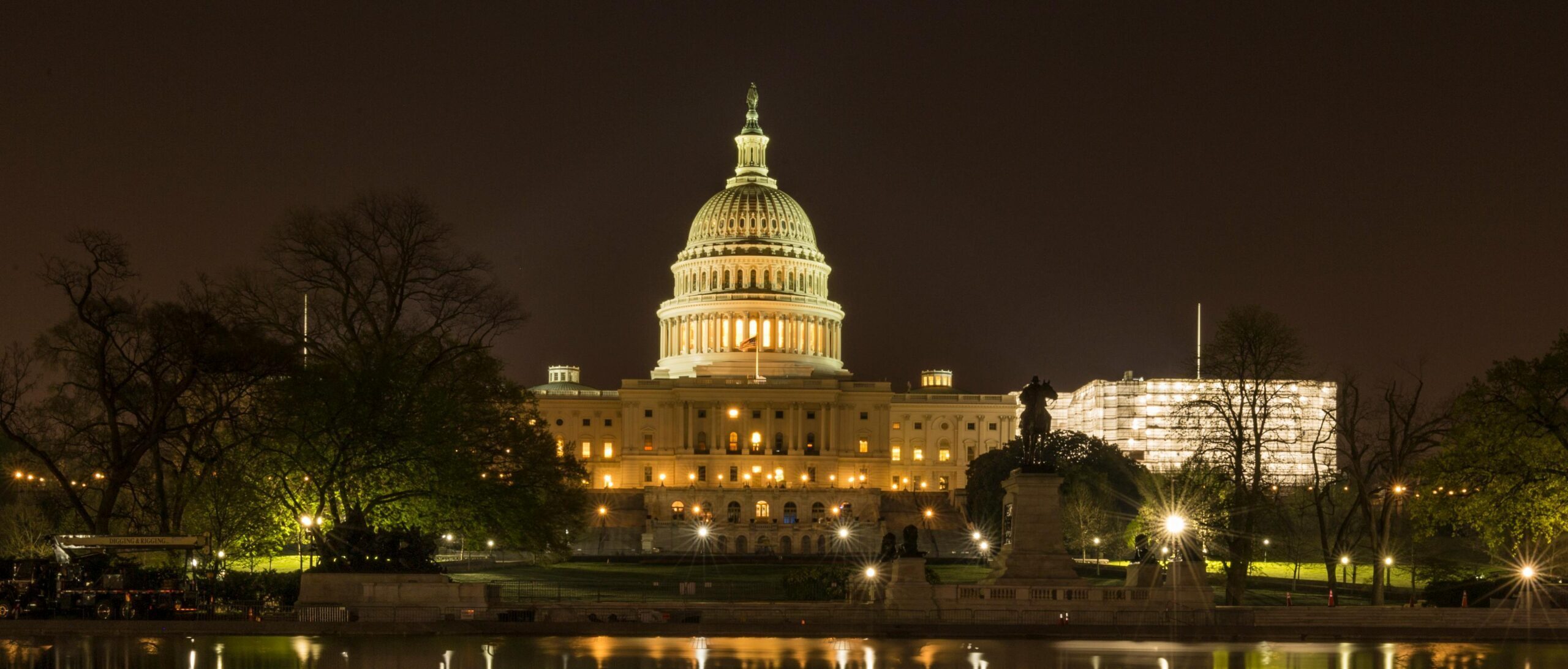 Photo by Trev W. Adams: https://www.pexels.com/photo/the-us-capitol-white-house-near-a-lake-at-night-6451438/